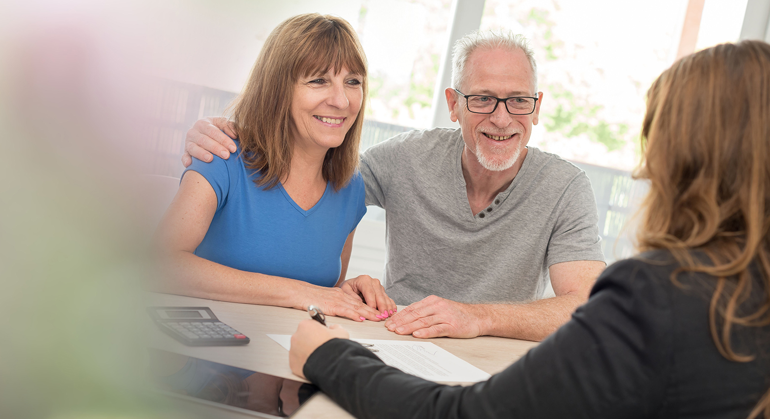 Senior couple meeting financial adviser