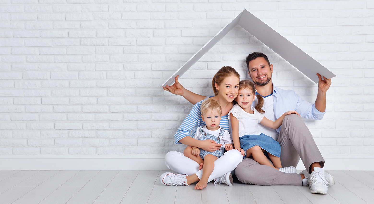 WFS-Home_WM concept housing a young family. mother father and children in new home